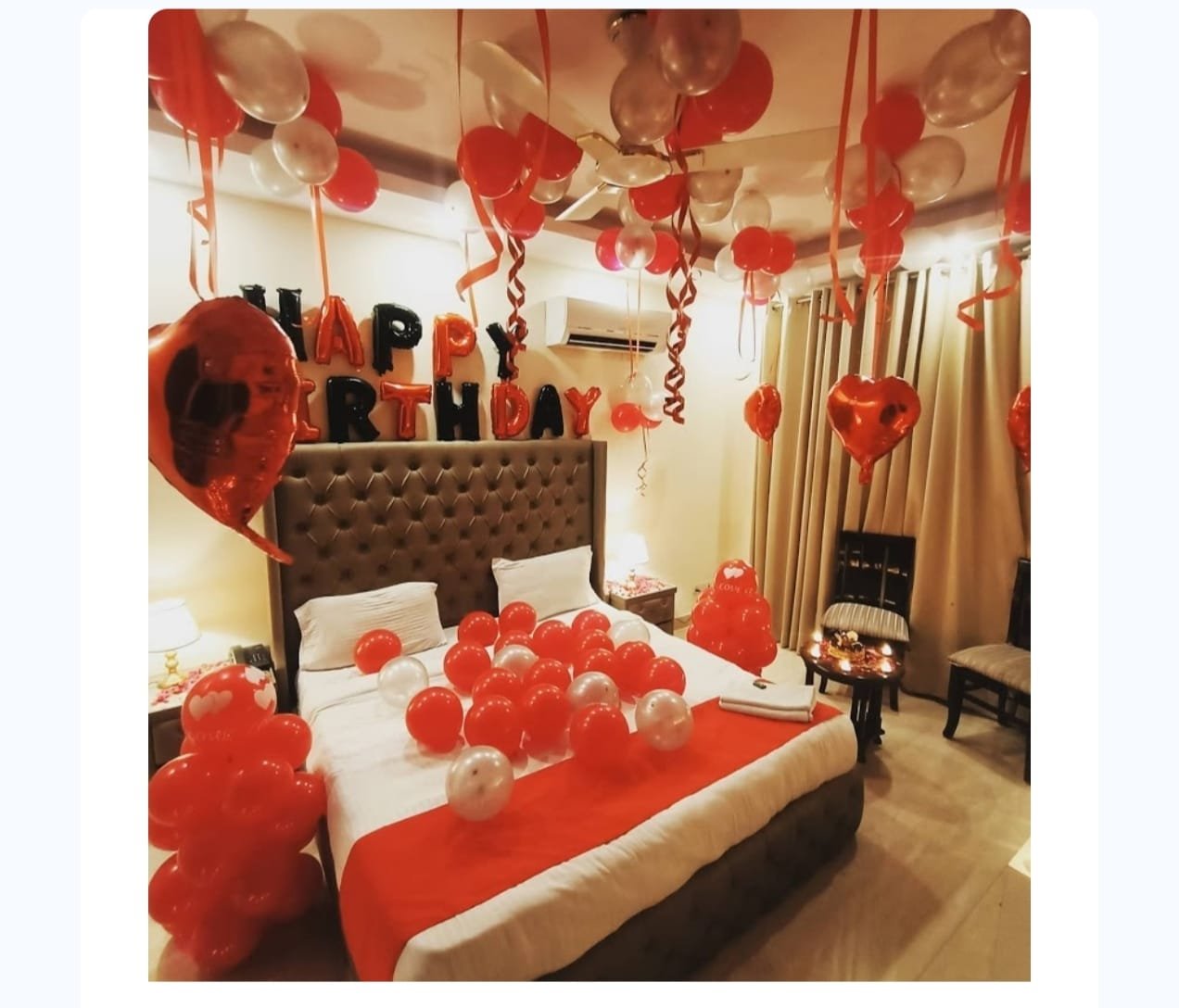 Red and white bedroom birthday balloon decoration